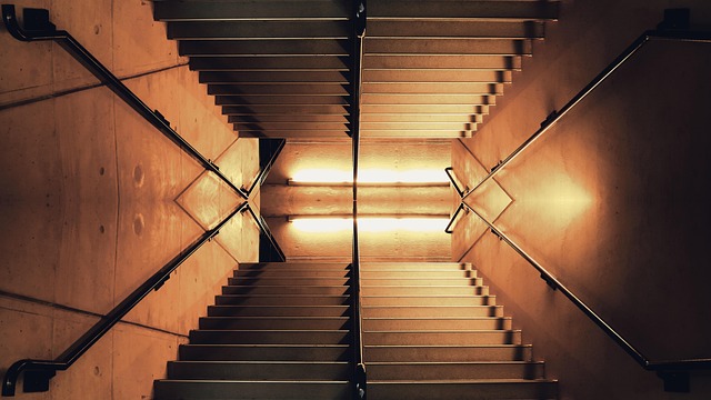 picture light illuminating shelves with warm, even glow