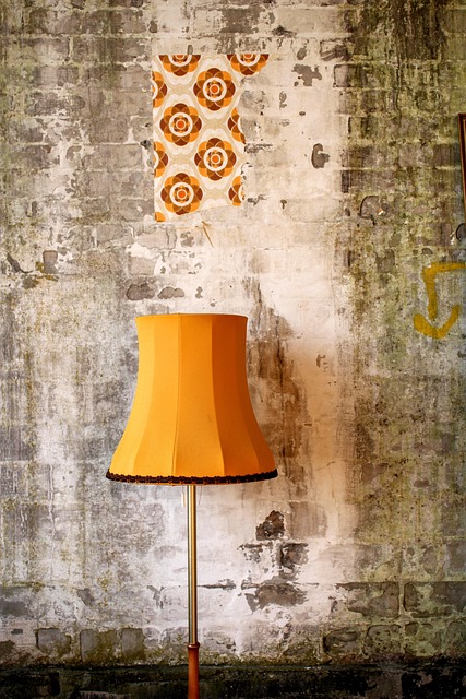 brass library lamp with green shade on desk
